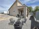 Backyard patio featuring an outdoor seating area with a fire pit and BBQ at 4830 E Comanche Dr, Pahrump, NV 89061