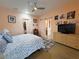 Spacious bedroom showcasing closet, dresser, barn door, and modern decor at 4830 E Comanche Dr, Pahrump, NV 89061