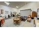 Large garage featuring a dining area and a seating area at 4830 E Comanche Dr, Pahrump, NV 89061