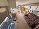Wide interior RV living area with comfortable seating and kitchenette visible at 4830 E Comanche Dr, Pahrump, NV 89061