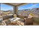 Relaxing balcony with comfortable seating and scenic views of the surrounding landscape at 5231 Iron River Ct, Las Vegas, NV 89135