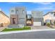Modern two-story home with contemporary architecture, desert landscaping, and a brick driveway at 5231 Iron River Ct, Las Vegas, NV 89135