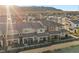 Townhouse complex with outdoor seating areas and manicured landscaping viewed aerially at 6144 Rathbone St, Las Vegas, NV 89166