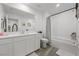 Bathroom with a large vanity, modern fixtures, and shower-tub combination at 6144 Rathbone St, Las Vegas, NV 89166