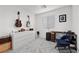 Bedroom featuring guitars on the wall, a white dresser, and desk at 6144 Rathbone St, Las Vegas, NV 89166