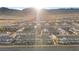 Overview of a housing community with neatly arranged homes at 6144 Rathbone St, Las Vegas, NV 89166