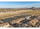 Aerial view showcasing the layout of a residential community with desert landscape at 6144 Rathbone St, Las Vegas, NV 89166