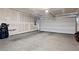 Spacious garage with ample room for parking and storage, featuring a concrete floor at 6144 Rathbone St, Las Vegas, NV 89166