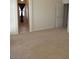 Spacious bedroom features neutral walls and carpet at 6461 Za Zu Pitts Ave # 102, Las Vegas, NV 89122