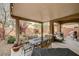 Outdoor living area featuring a table and chairs under a covered patio at 6470 Little Harbor Ct, Las Vegas, NV 89141