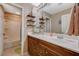 Bathroom featuring a sink with vanity, a mirror and a shower tub at 6470 Little Harbor Ct, Las Vegas, NV 89141