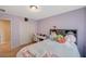 Comfortable bedroom with a bed, desk, and closet at 6470 Little Harbor Ct, Las Vegas, NV 89141