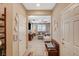 Bright foyer leading into a spacious living area with tile flooring at 6470 Little Harbor Ct, Las Vegas, NV 89141