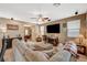 Spacious living room with comfortable seating, natural light, and modern fixtures at 6470 Little Harbor Ct, Las Vegas, NV 89141