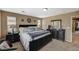 Relaxing main bedroom with neutral colors, large window, carpet flooring, and a spacious layout at 6470 Little Harbor Ct, Las Vegas, NV 89141