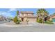 Charming two-story home featuring desert landscaping and a spacious two car garage at 6586 Mount Roy Ln, Las Vegas, NV 89156
