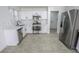 Stylish kitchen with stainless steel appliances and marble countertops and sink at 6586 Mount Roy Ln, Las Vegas, NV 89156