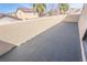 Open patio space with stucco walls and great views of the neighborhood at 6586 Mount Roy Ln, Las Vegas, NV 89156