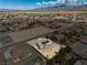 Aerial view of the property highlighting the home, solar panels and large lot at 6751 Stubblefield Dr, Pahrump, NV 89061