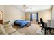 Spacious bedroom with carpet floor, ceiling fan, and neutral color palette at 6751 Stubblefield Dr, Pahrump, NV 89061