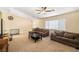 Inviting living room featuring neutral colors, vaulted ceilings, and large windows at 6751 Stubblefield Dr, Pahrump, NV 89061
