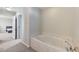 Elegant bathroom with soaking tub and a separate shower room at 6773 Goose Watch Ct, Las Vegas, NV 89139
