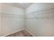 Walk-in closet with wire shelving and carpet flooring at 6773 Goose Watch Ct, Las Vegas, NV 89139