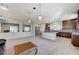 Bright, open kitchen featuring stainless steel appliances, granite countertops, and ample cabinet space at 6773 Goose Watch Ct, Las Vegas, NV 89139