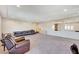 Open living area features neutral walls, recessed lighting, and ample space for relaxation at 6773 Goose Watch Ct, Las Vegas, NV 89139