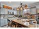 Beautiful kitchen with stainless steel appliances, mosaic backsplash, and granite countertops at 6929 Benson Ferry St, Las Vegas, NV 89149