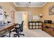 Comfortable office space offers built-in storage, an organized workspace, and natural light at 6929 Benson Ferry St, Las Vegas, NV 89149