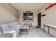 Cozy covered patio with comfortable seating, perfect for relaxing and enjoying the outdoors at 6929 Benson Ferry St, Las Vegas, NV 89149