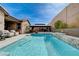 Tranquil pool with lounge area and gazebo, perfect for summer fun and relaxation at 6929 Benson Ferry St, Las Vegas, NV 89149