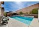 Refreshing swimming pool with a sun-soaked lounging area and a shaded gazebo for outdoor entertaining at 6929 Benson Ferry St, Las Vegas, NV 89149
