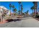Gated entrance to the community with palm trees in the entryway that leads into the neighborhood at 700 Carnegie St # 3214, Henderson, NV 89052
