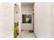 Welcoming entryway with textured walls, a window, and a 'Welcome' mat at 700 Carnegie St # 3214, Henderson, NV 89052