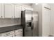 Kitchen featuring stainless steel appliances, subway tile backsplash, and modern cabinetry at 700 Carnegie St # 3214, Henderson, NV 89052