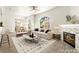 Bright living room boasts a fireplace, modern decor, and plenty of natural light at 700 Carnegie St # 3214, Henderson, NV 89052