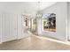 Bright living room featuring sliding glass doors to a patio and arched windows for natural light at 700 Carnegie St # 3214, Henderson, NV 89052