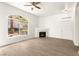 Spacious living room with natural light, fireplace, and hardwood-style flooring at 700 Carnegie St # 3214, Henderson, NV 89052