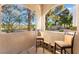 A cozy patio with comfortable seating offers views of the landscaped outdoor area at 700 Carnegie St # 3214, Henderson, NV 89052