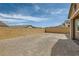Spacious backyard with cinder block fence, offering plenty of room for outdoor activities and entertaining at 728 Omaggio Pl, Henderson, NV 89011