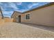 Gravel backyard featuring a private courtyard, offering a serene outdoor space with brick trim at 728 Omaggio Pl, Henderson, NV 89011