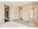 Spacious bedroom with carpet, multiple doors, and a glass-enclosed shower at 728 Omaggio Pl, Henderson, NV 89011