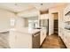 Modern kitchen with a large island, stainless steel appliances, and ample counter space at 728 Omaggio Pl, Henderson, NV 89011