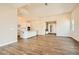 Large and spacious living area with hardwood floors, offering flexible design options at 728 Omaggio Pl, Henderson, NV 89011