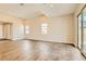 Hardwood floors highlight the spacious living area with recessed lighting at 728 Omaggio Pl, Henderson, NV 89011