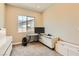 Bright office featuring a modern desk, gray carpet, and ample natural light at 728 Omaggio Pl, Henderson, NV 89011