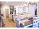 Bright kitchen with stainless steel appliances, white cabinets, and a center island at 8224 Opal Falls St, North Las Vegas, NV 89085