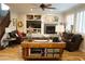 Spacious living room with built-in shelves, hardwood floors, and ample seating at 8224 Opal Falls St, North Las Vegas, NV 89085